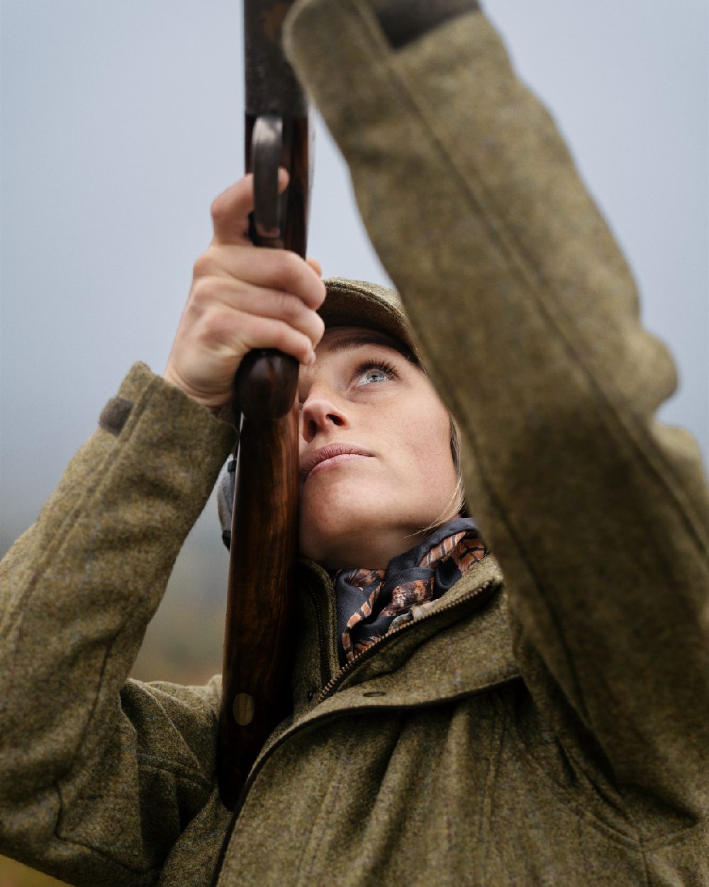 Olive Coloured Harkila Womens Jura GTX Jacket on fog background #colour_olive