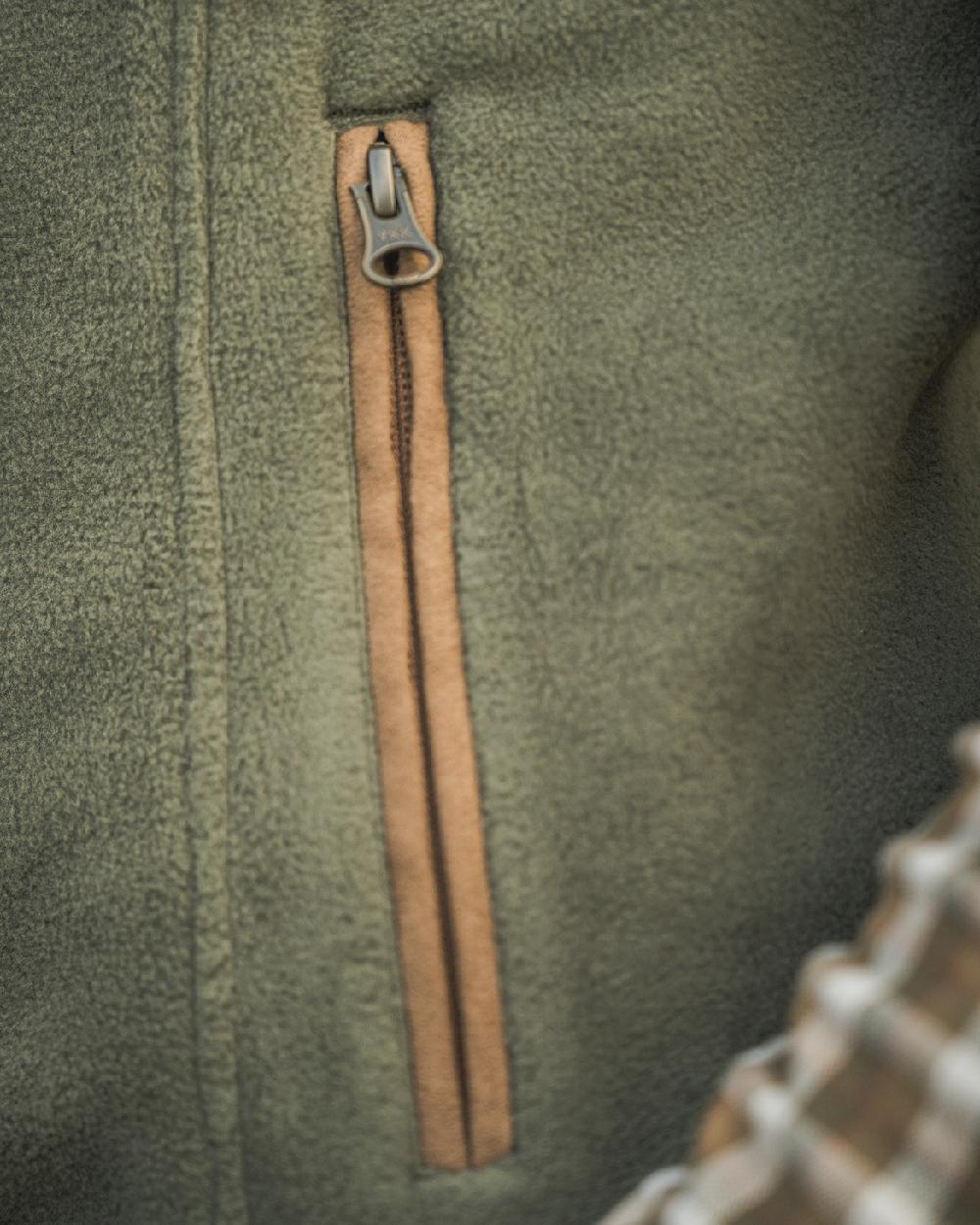 Grape Leaf Coloured Harkila Womens Sandhem 200 Fleece Waistcoat on outdoor background #colour_grape-leaf