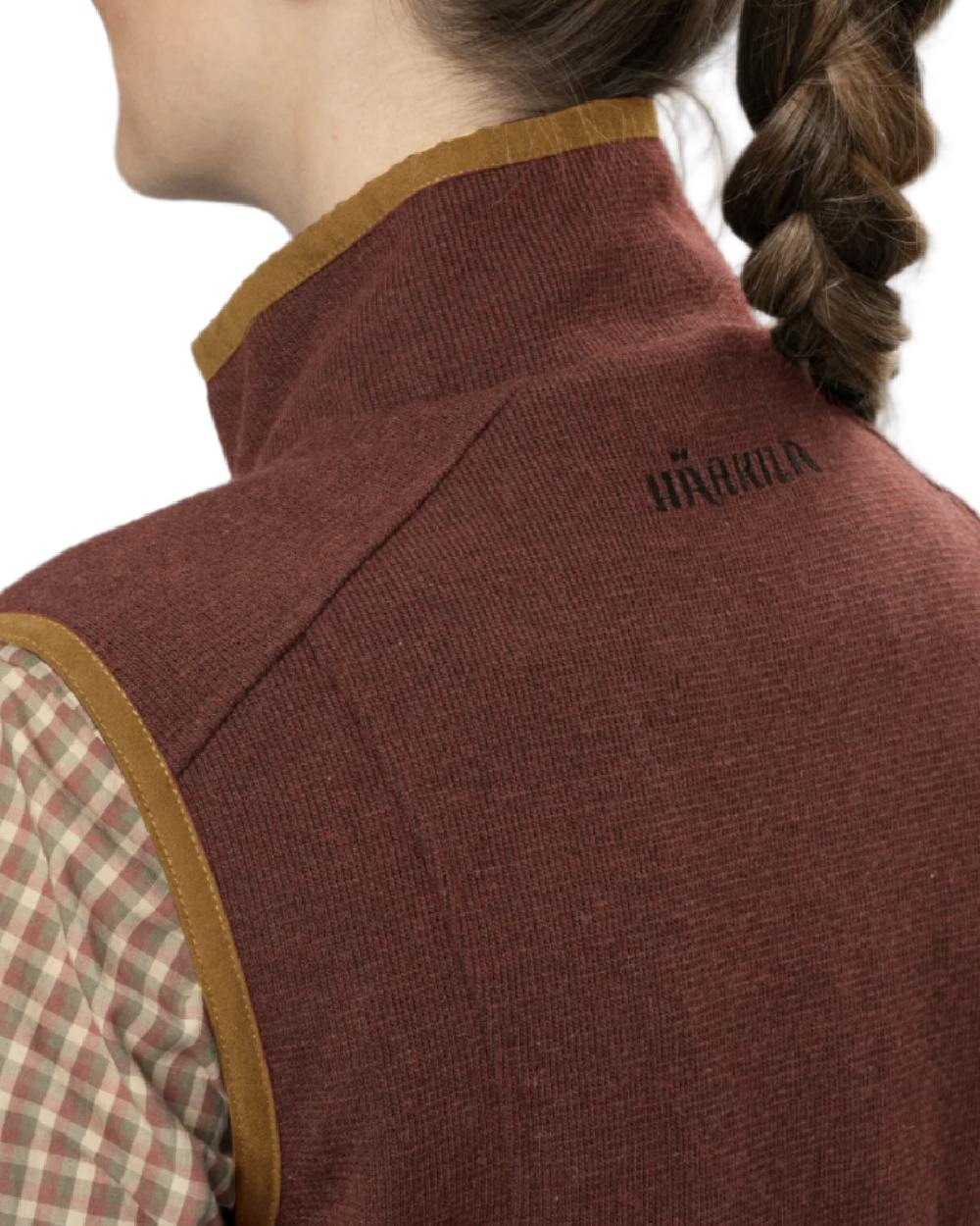 Dark Copper Coloured Harkila Womens Sandhem Pro Waistcoat on white background #colour_dark-copper