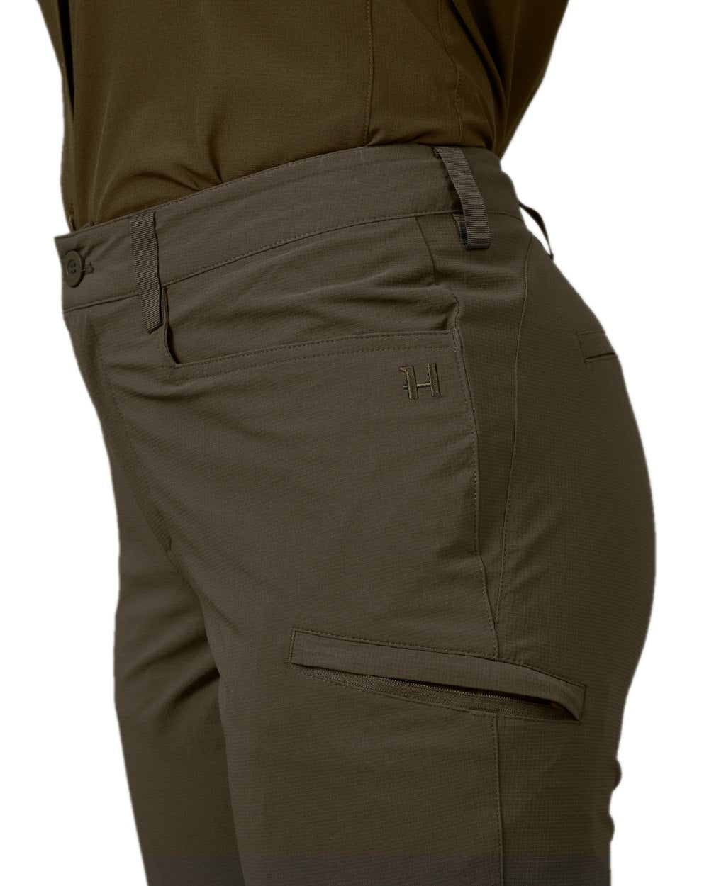 Willow Green Coloured Harkila Womens Trail Trousers on white background #colour_willow-green