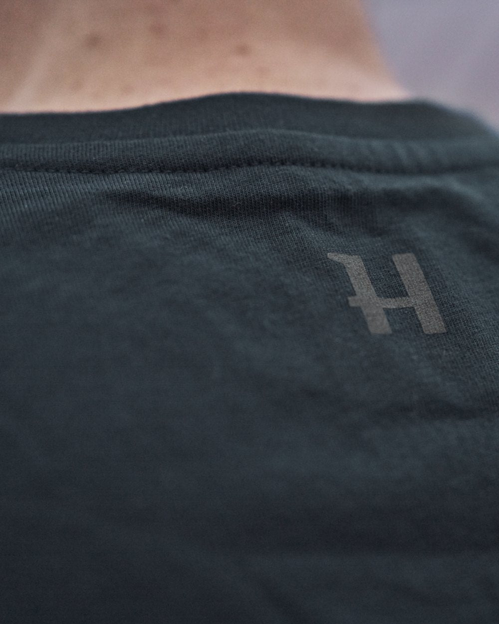 Dark Navy Coloured Harkila logo Short Sleeve T-Shirt on outdoor background #colour_dark-navy