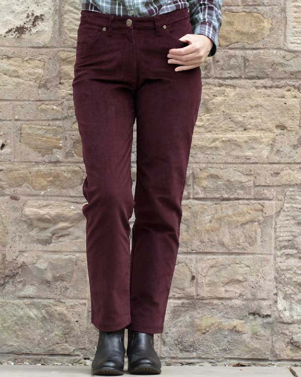 Merlot Coloured Hoggs of Fife Ceres Ladies Stretch Cord Jeans on wall background #colour_merlot