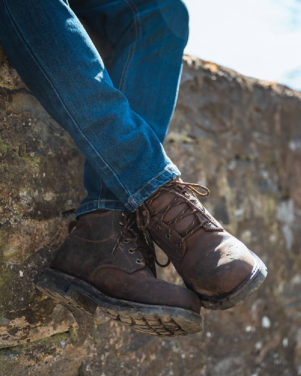 Crazy Horse Brown Coloured Hoggs of Fife Cronos Pro Boot on wall background #colour_crazy-horse-brown