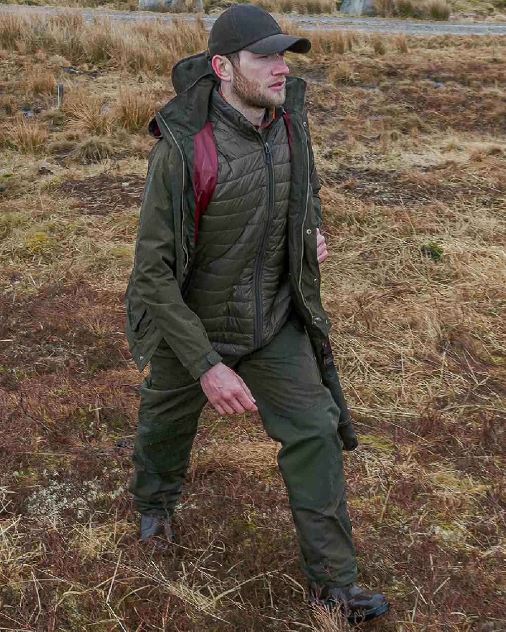 Fen Green Coloured Hoggs of Fife Culloden Waterproof Trousers on land background #colour_fen-green