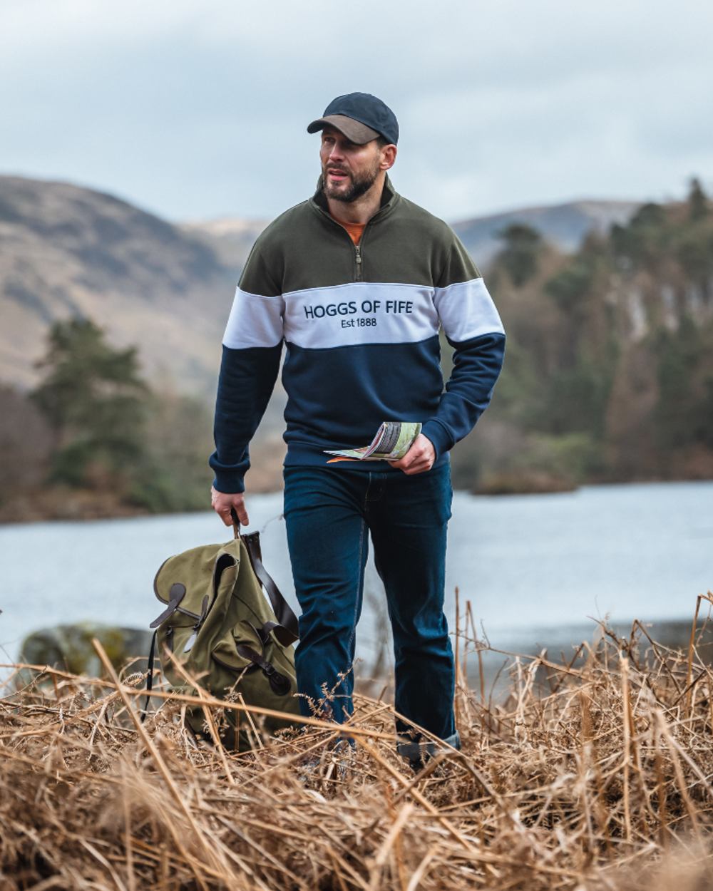 Forest White Navy Coloured Hoggs of Fife Dumfries 1888 Mens Quarter Zip Sweatshirt on lake background #colour_forest-white-navy