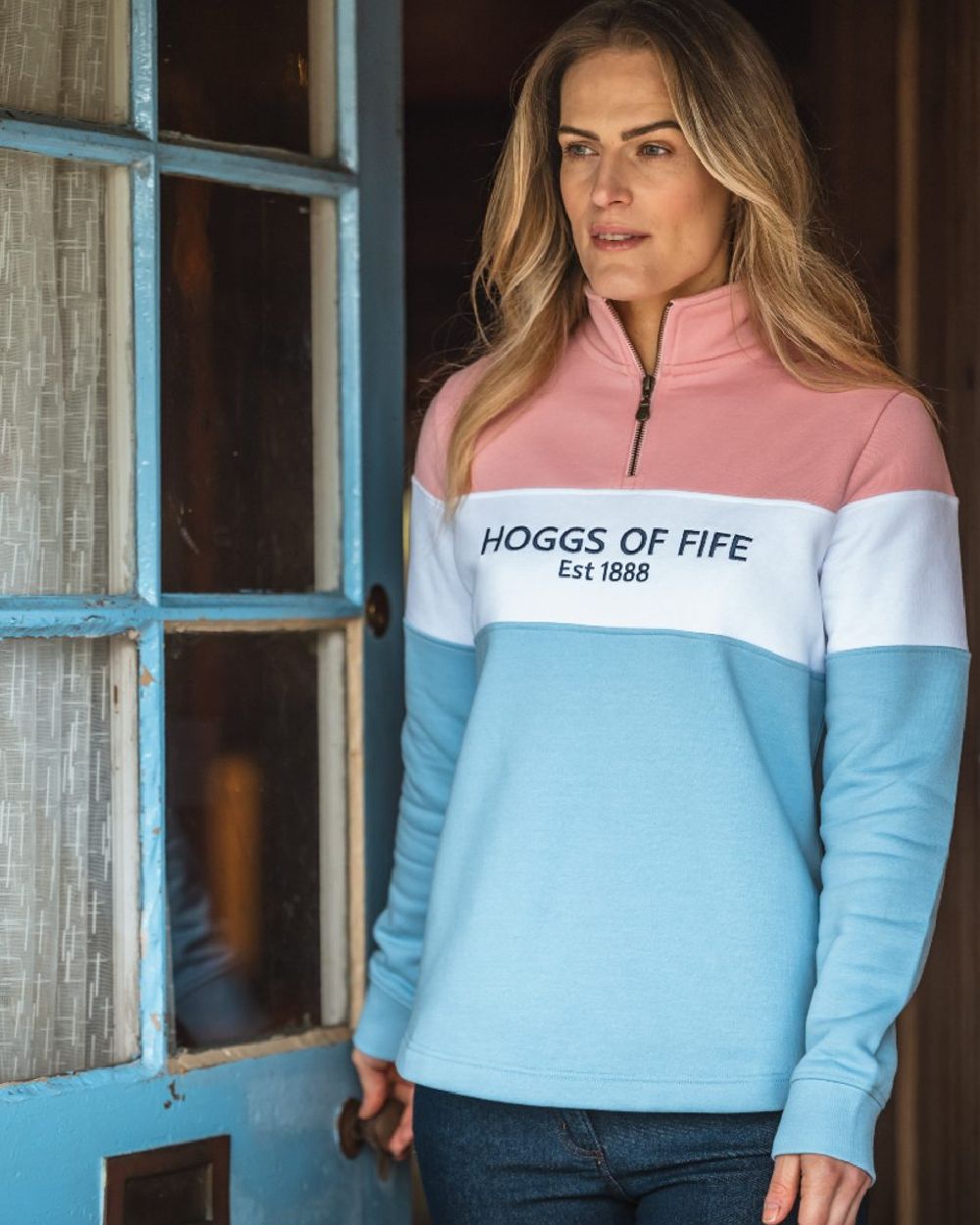 Pink White Blue Coloured Hoggs of Fife Dumfries 1888 Womens Quarter Zip Sweatshirt on door background #colour_pink-white-blue