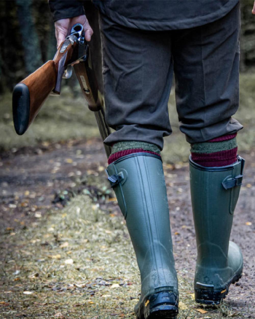 Field Green Coloured Hoggs of Fife Field Sport Neoprene Lined Wellingtons on land background #colour_field-green
