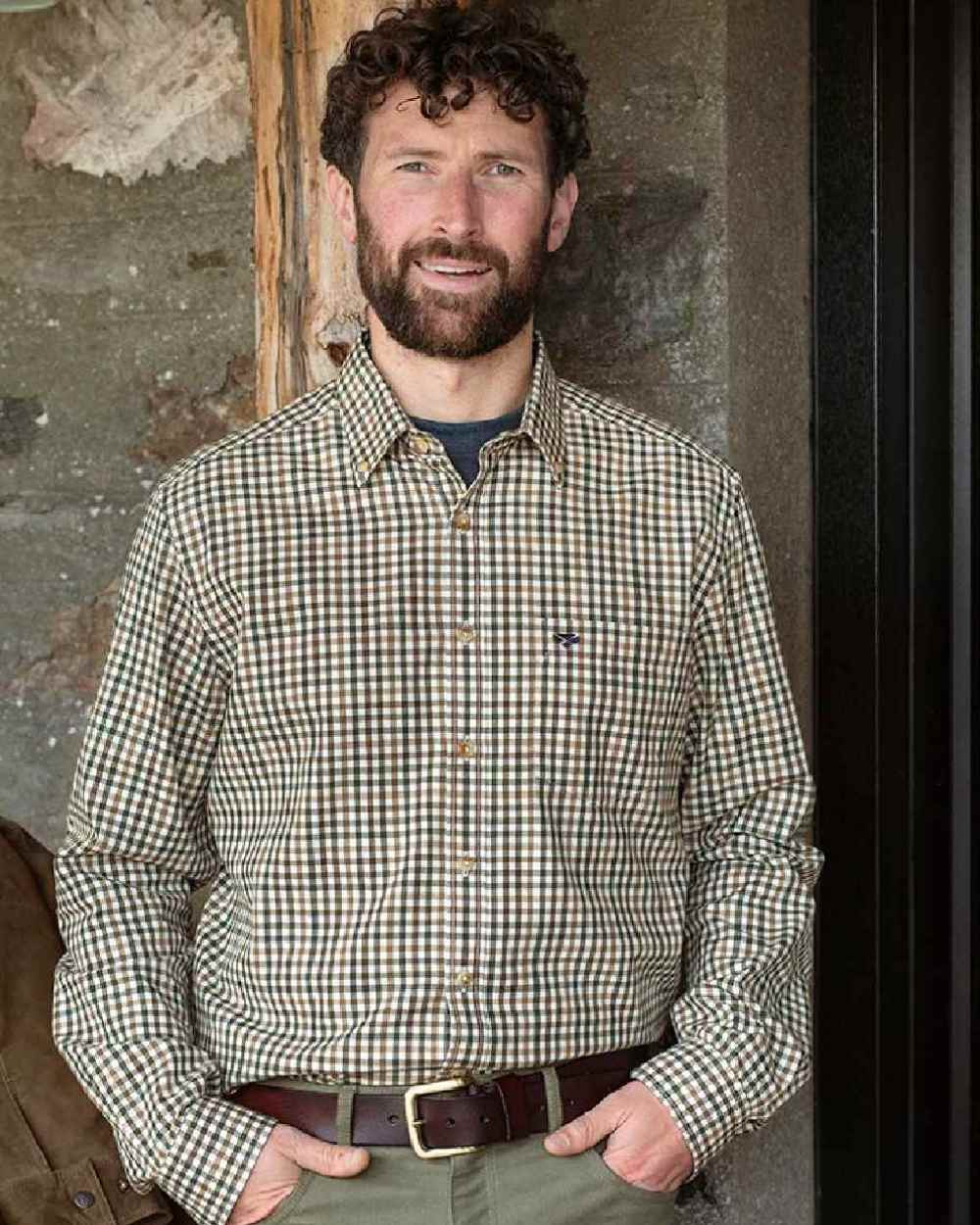 Brown Green Coloured Hoggs of Fife Garvock Cotton Twill Herringbone Check Shirt on wall background #colour_brown-green