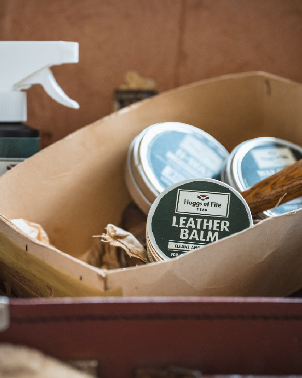 Neutral Coloured Hoggs of Fife H-Wax Dressing 100ml Tin on storage background #colour_neutral