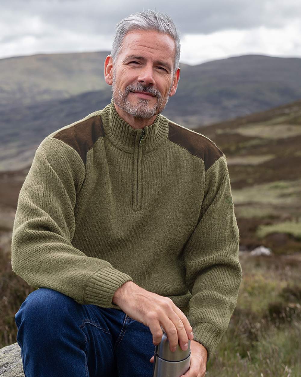 Meadow Green Coloured Hoggs of Fife Hebrides II Quarter Zip Windproof Pullover on mountain background #colour_meadow-green