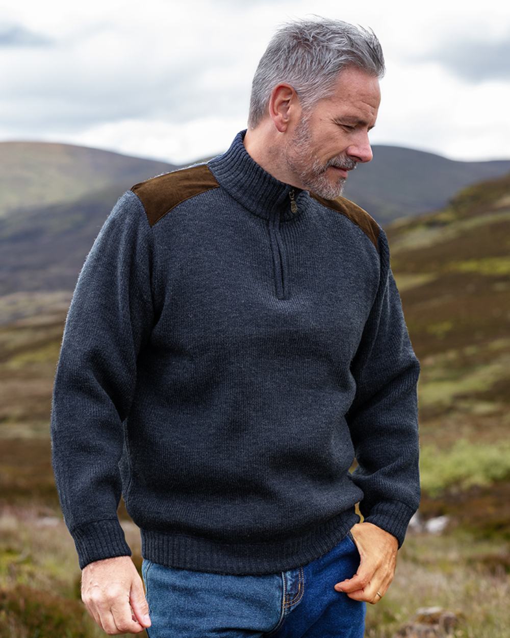 Storm Blue Coloured Hoggs of Fife Hebrides II Quarter Zip Windproof Pullover on mountain background #colour_storm-blue