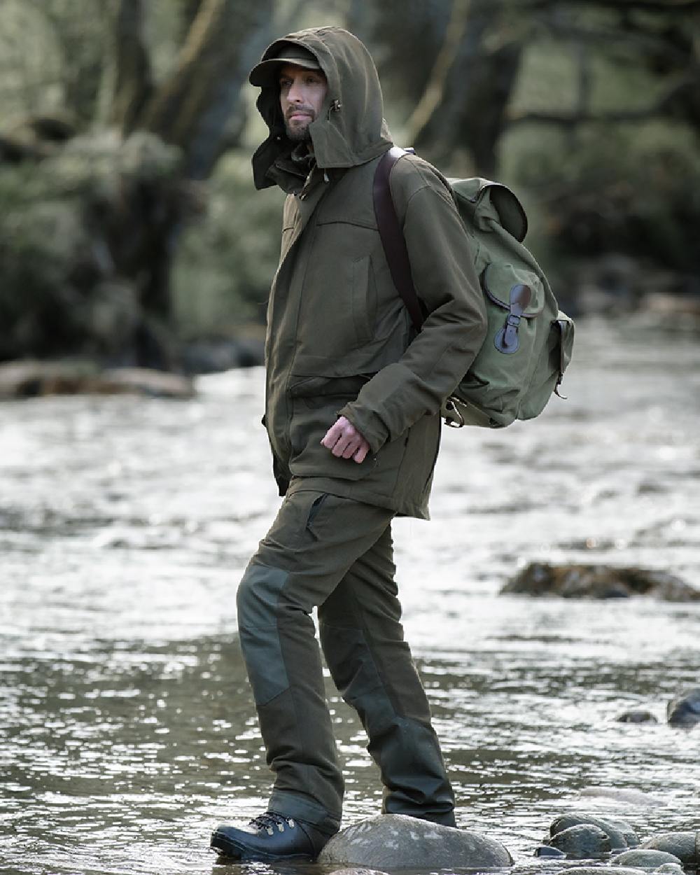 Olive Green Coloured Hoggs of Fife Kincraig Waterproof Field Jacket on river background #colour_olive-green