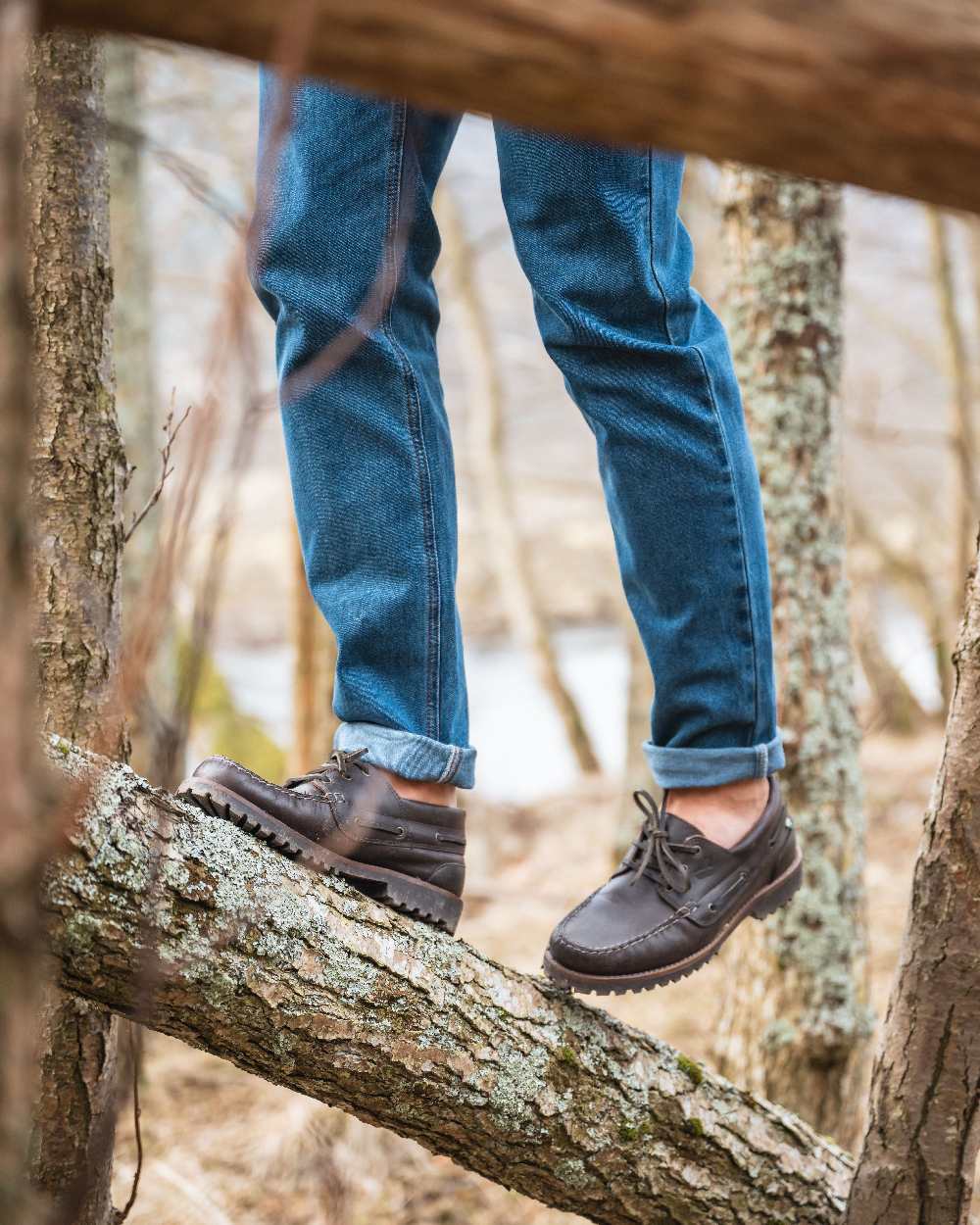Chestnut Coloured Hoggs of Fife Kintyre Rugged Moccasin Boat Shoes on forest background #colour_chestnut