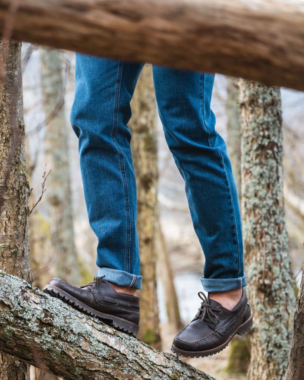 Chestnut Coloured Hoggs of Fife Kintyre Rugged Moccasin Boat Shoes on forest background #colour_chestnut