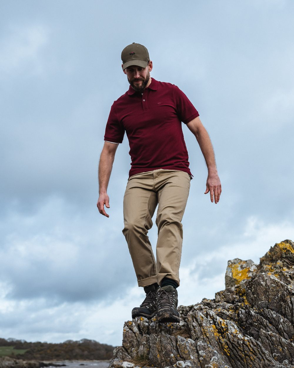 Bordeaux Coloured Hoggs of Fife Largs Pique Polo Shirt on sky background #colour_bordeaux