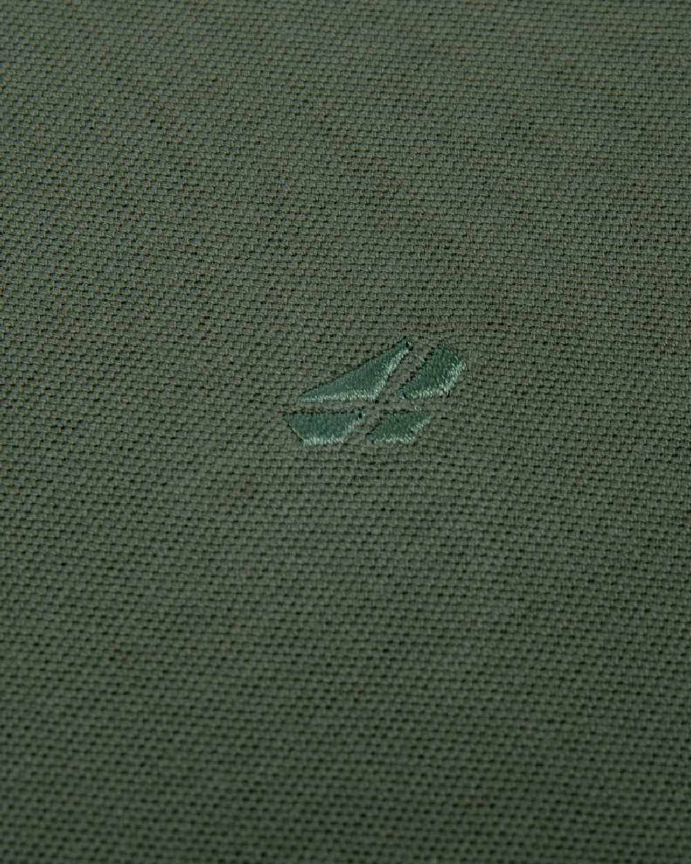 Bottle Green Coloured Hoggs of Fife Largs Pique Polo Shirt on white background #colour_bottle-green