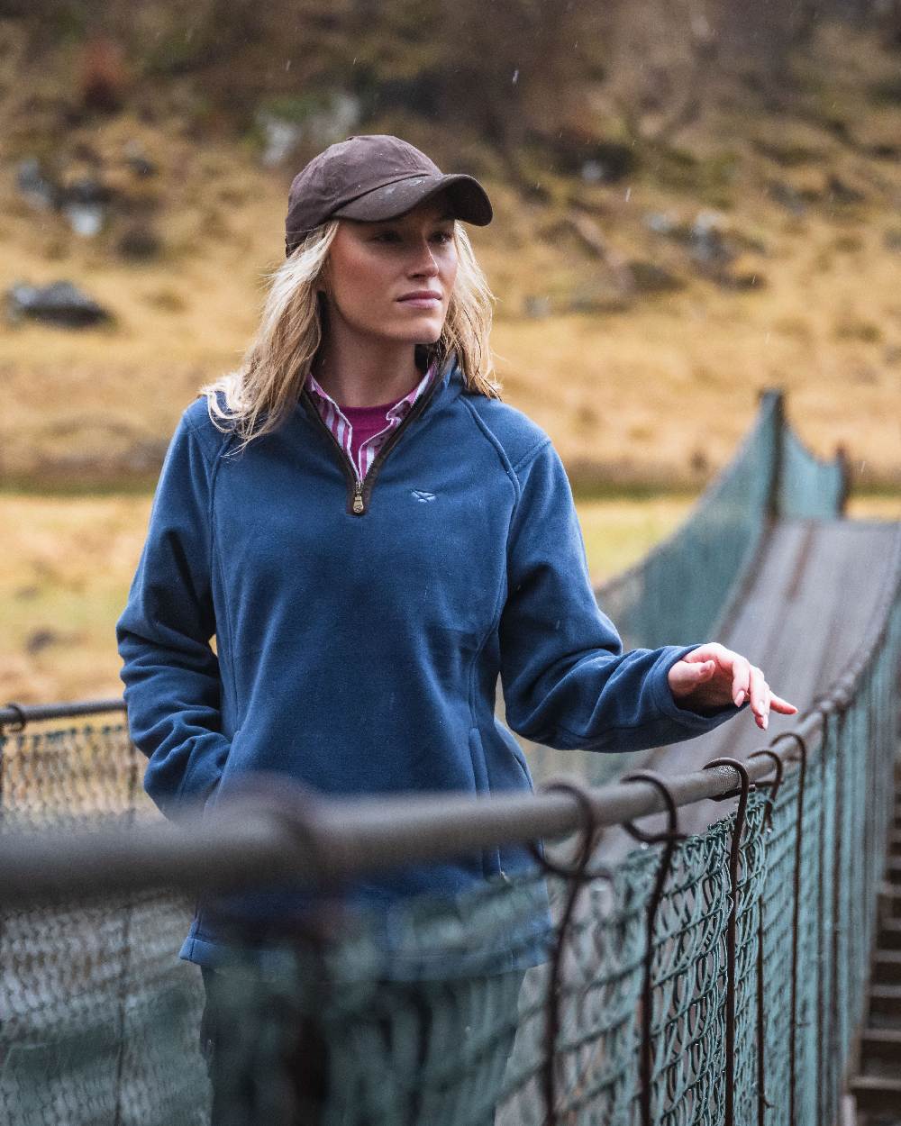Brown Coloured Hoggs of Fife Leather Peak Waxed Baseball Cap on countryside background #colour_brown