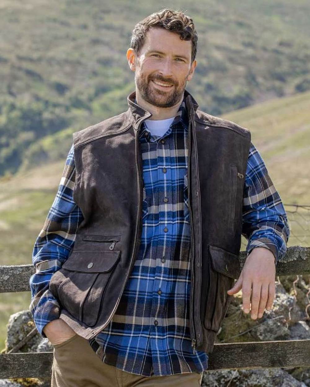 Chocolate Coloured Hoggs of Fife Lomond II Leather Waistcoat on mountain background #colour_chocolate
