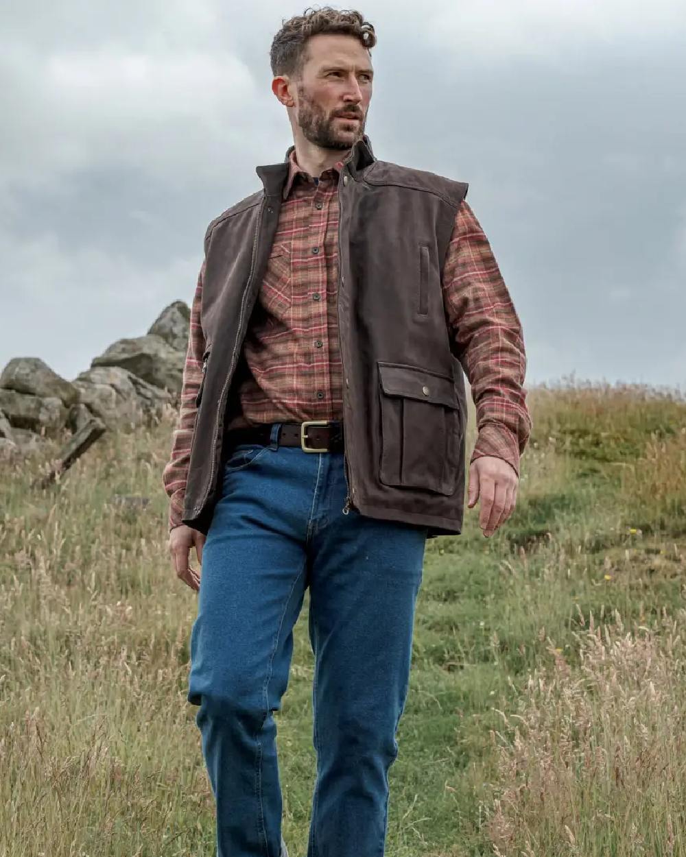 Chocolate Coloured Hoggs of Fife Lomond II Leather Waistcoat on mountain background #colour_chocolate