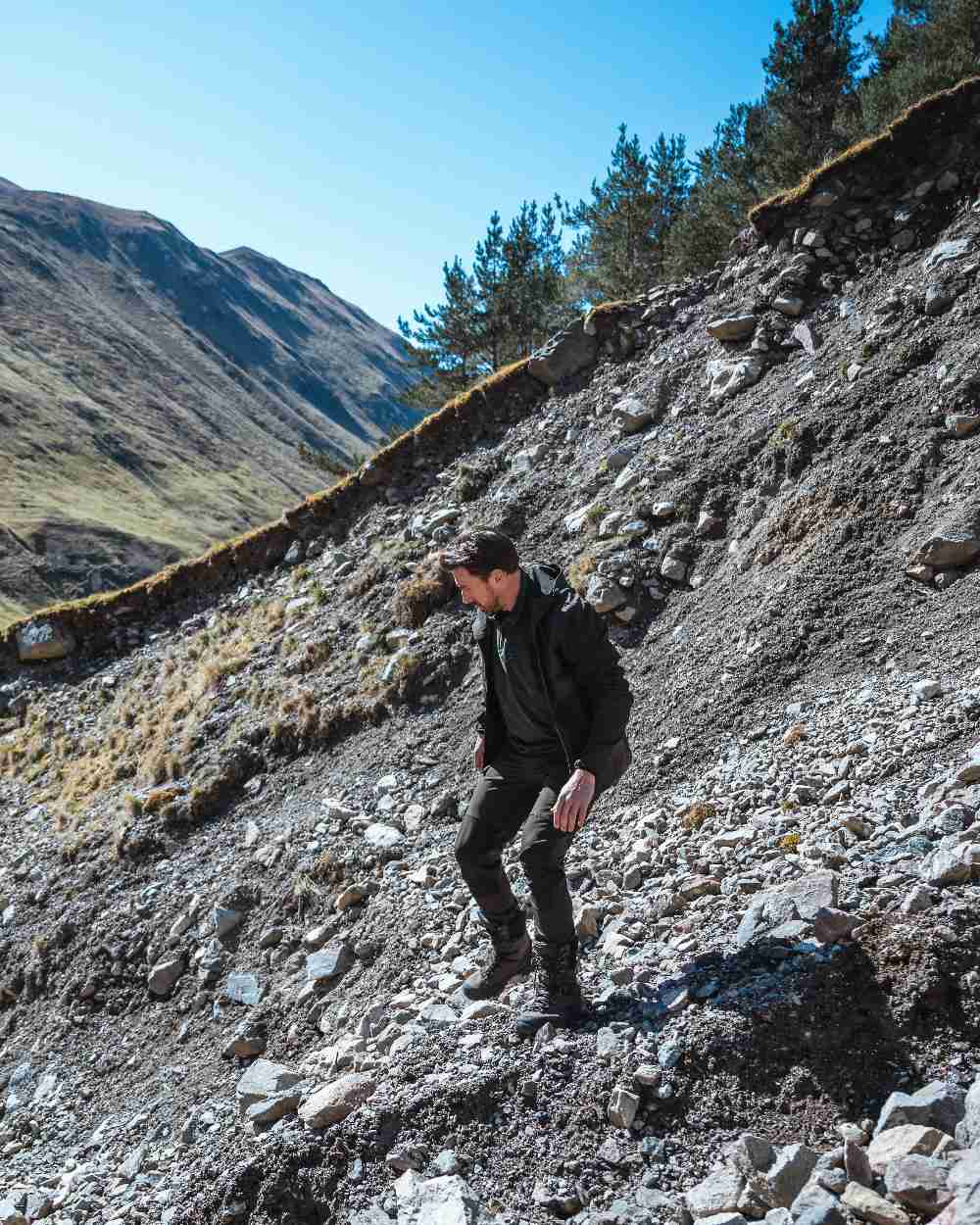 Green Coloured Hoggs of Fife Mens Ardross 4 Way Active Jacket on mountain background #colour_green