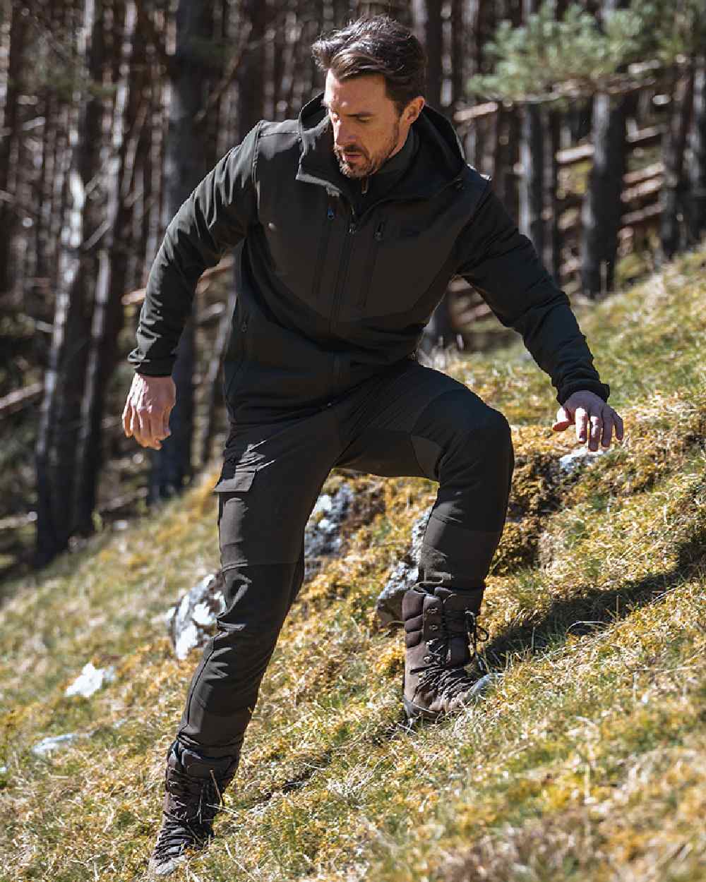 Green Coloured Hoggs of Fife Mens Ardross 4 Way Active Jacket on mountain background #colour_green