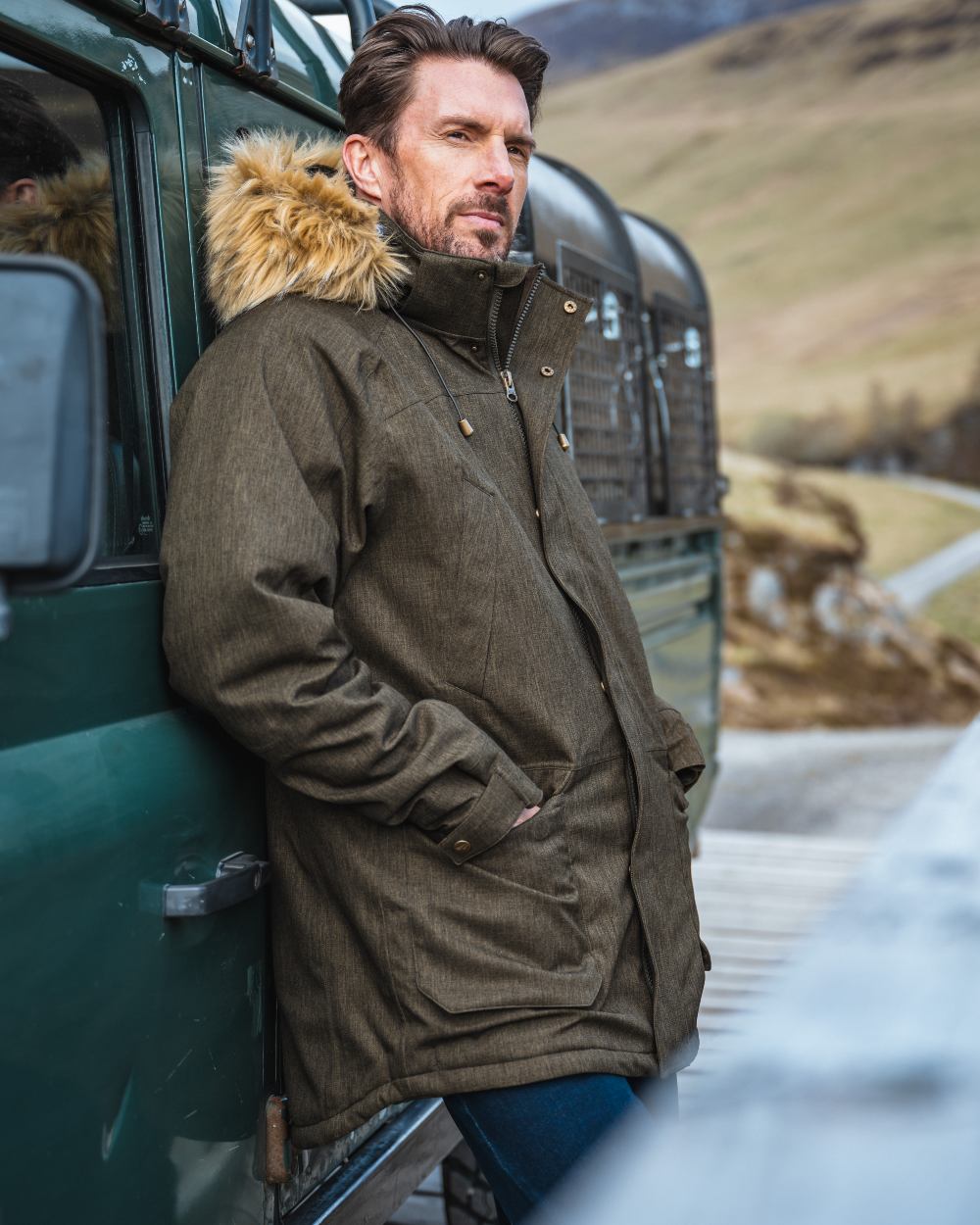 Forest Green coloured Hoggs of Fife Mens Argyll II Jacket on mountain background #colour_forest-green