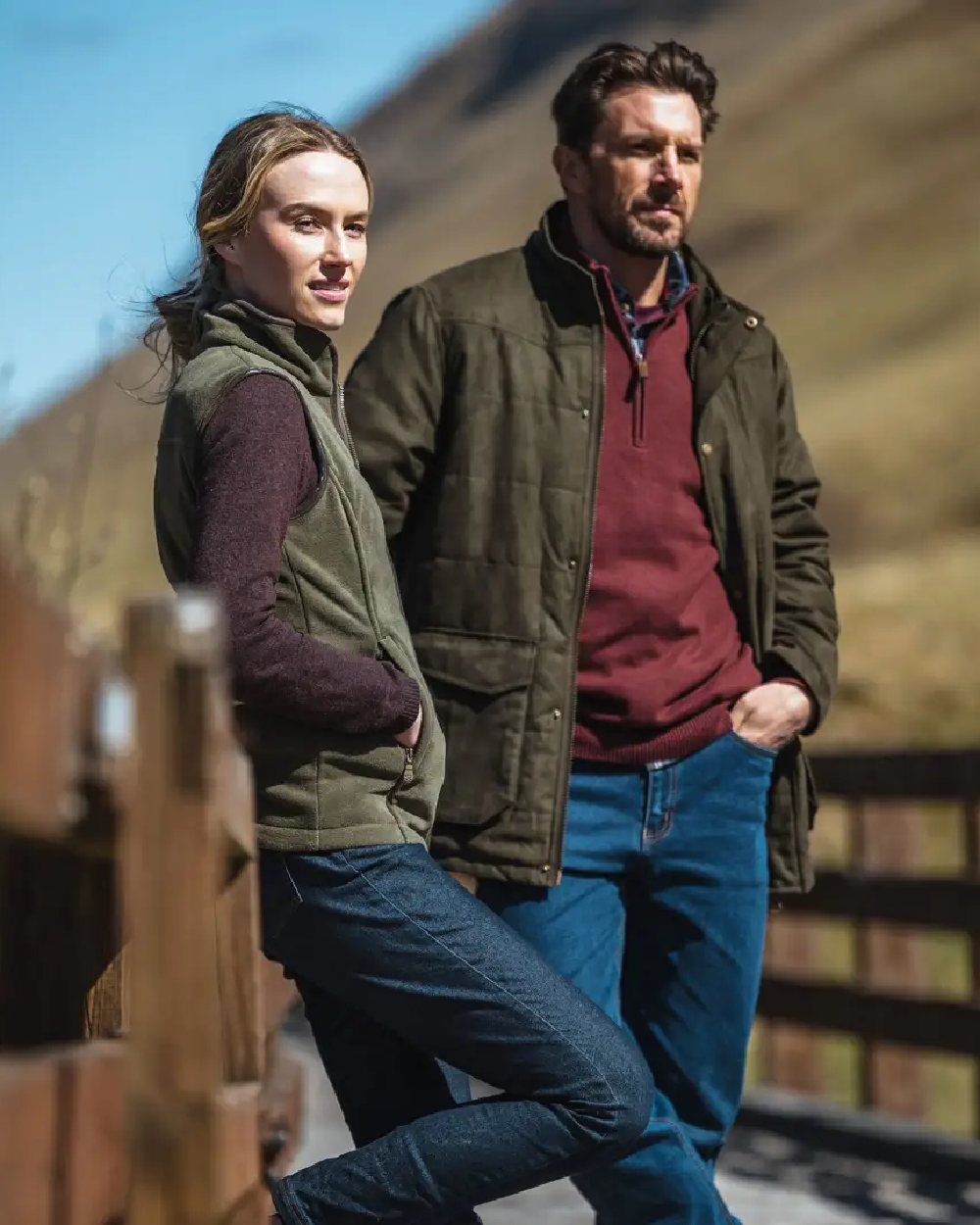 Loden coloured Hoggs of Fife Mens Glenesk Quilted Jacket on blurry background #colour_loden