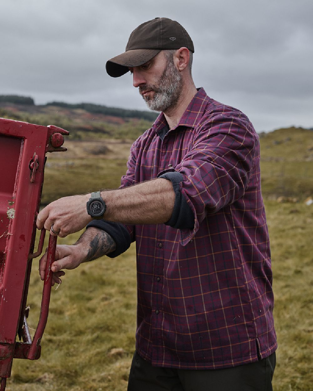 Bramble Wine Check Coloured Hoggs of Fife Micro Fleece Lined Shirt on mountain background #colour_bramble-wine-check