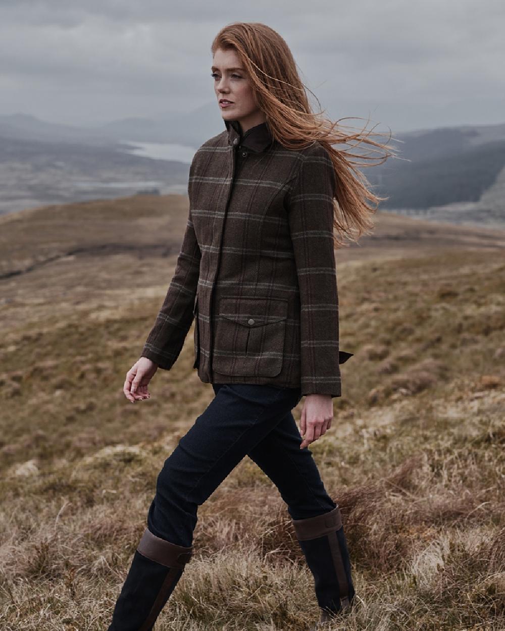 Bracken Tweed Coloured Hoggs of Fife Musselburgh Tweed Field Coat on mountain background #colour_bracken-tweed