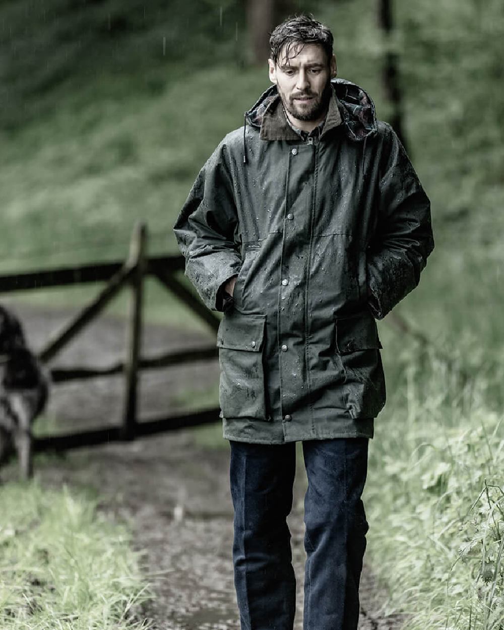 Olive Coloured Hoggs of Fife Padded Waxed Jacket on forest background #colour_olive