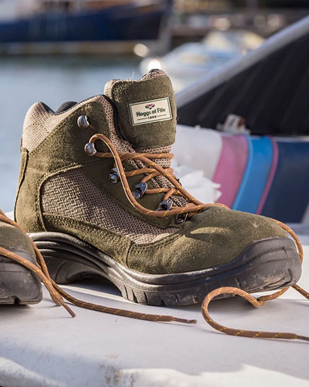 Fern Green Coloured Hoggs of Fife Rambler Waterproof Hiking Boots on boat background #colour_fern-green