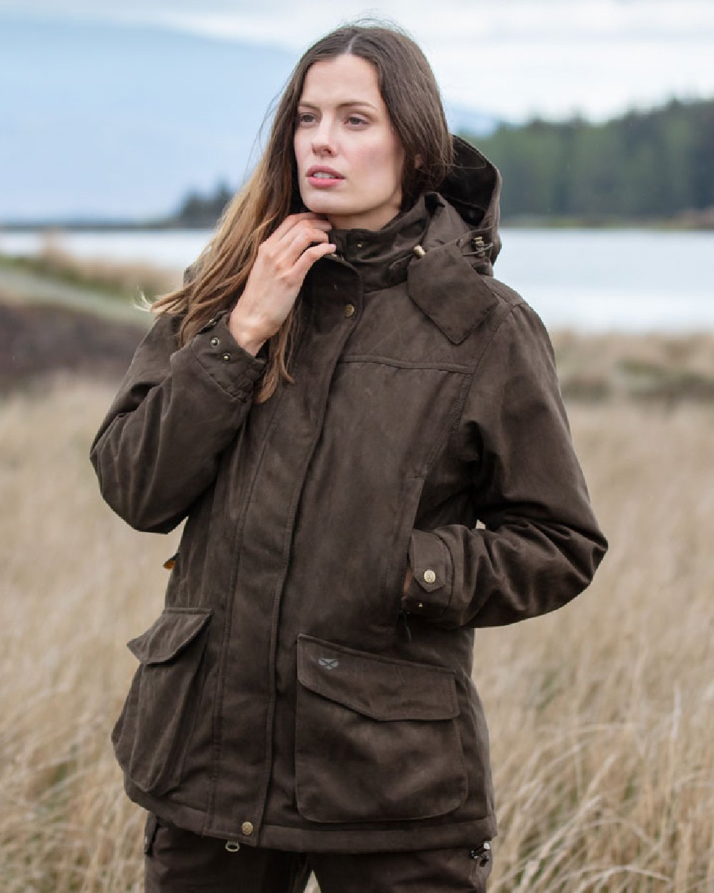 Field Green Coloured Hoggs of Fife Rannoch Ladies Hunting Jacket on grass background #colour_field-green