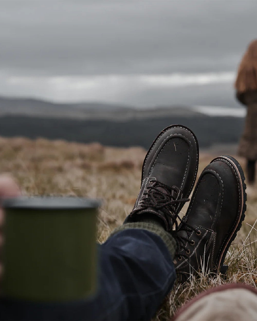 Oak Brown Coloured Hoggs of Fife Selkirk Moc Work Boots on countryside background #colour_oak-brown