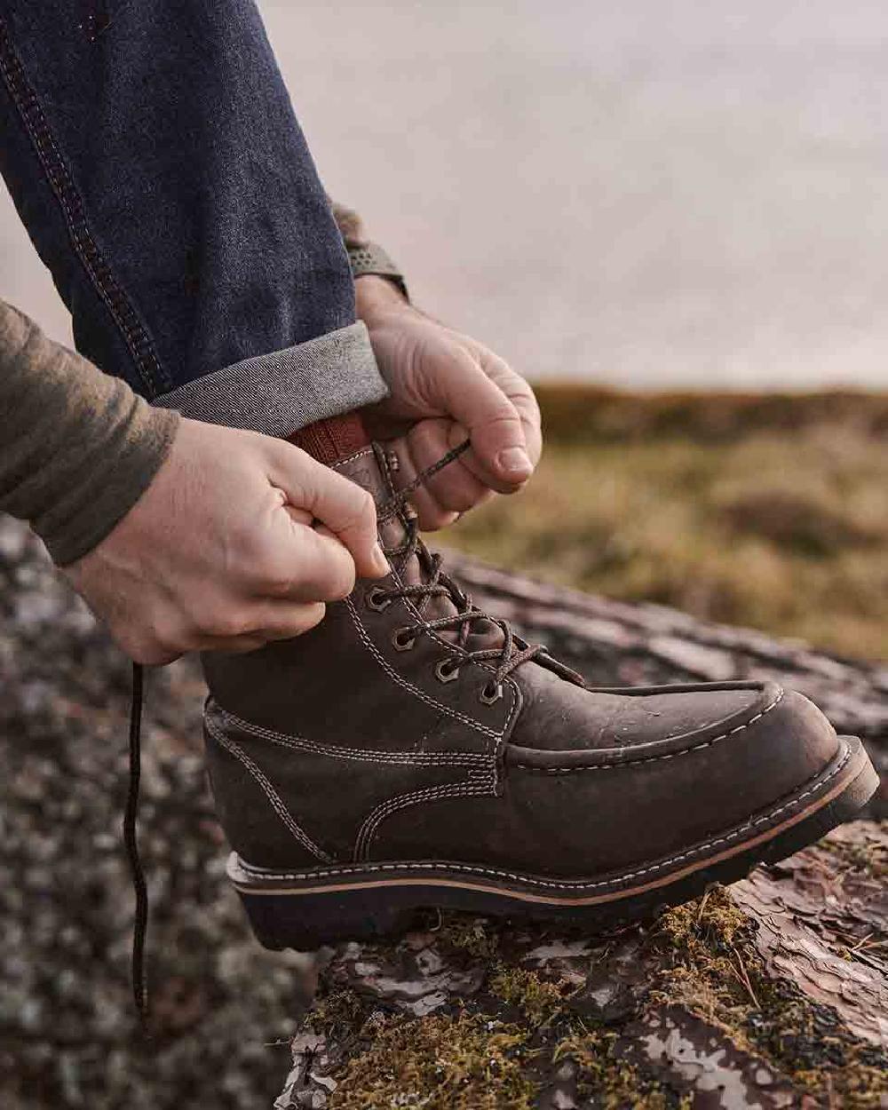 Oak Brown Coloured Hoggs of Fife Selkirk Moc Work Boots on countryside background #colour_oak-brown