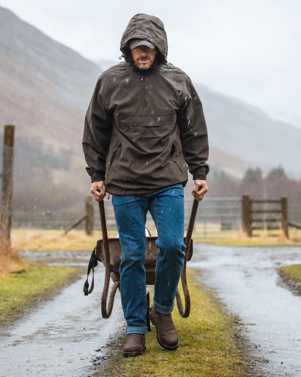 Crazy Horse Brown Coloured Hoggs of Fife Shire Pro Waterproof Dealer Boots on countryside background #colour_crazy-horse-brown