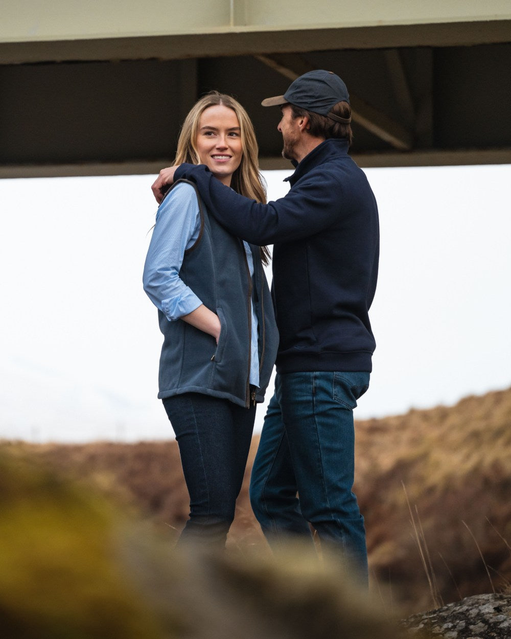 Slate Grey Coloured Hoggs of Fife Stenton Ladies Fleece Gilet on countryside background #colour_slate-grey