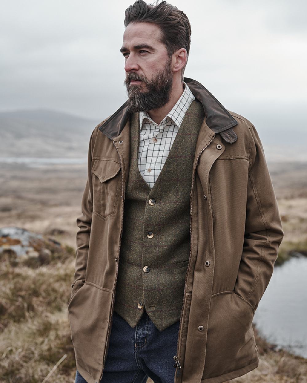 Camel Coloured Hoggs of Fife Stewarton Canvas Coat on countryside background #colour_camel