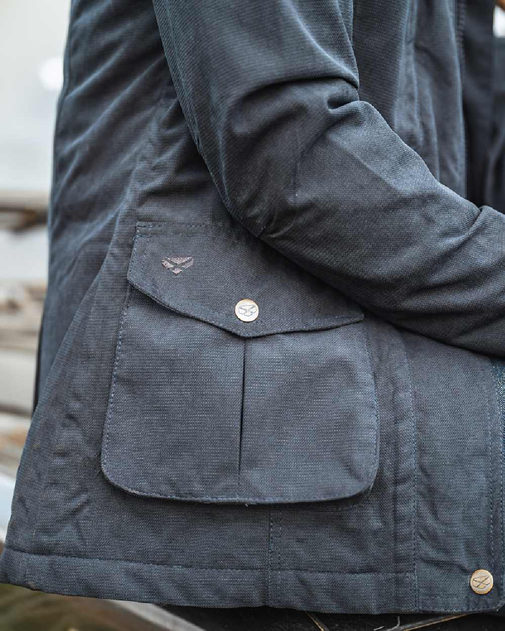 Navy Coloured Hoggs of Fife Struther Ladies Hooded Field Coat on blurry background #colour_navy