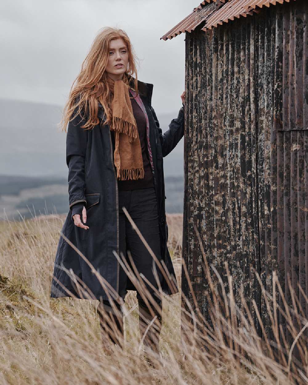 Navy Coloured Hoggs of Fife Struther Ladies Long Riding Coat on mountain background #colour_navy