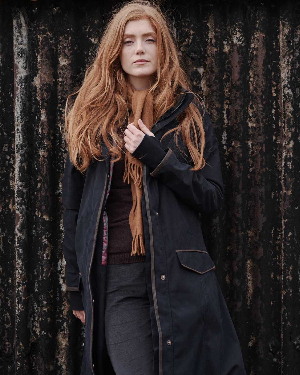 Navy Coloured Hoggs of Fife Struther Ladies Long Riding Coat on wall background #colour_navy