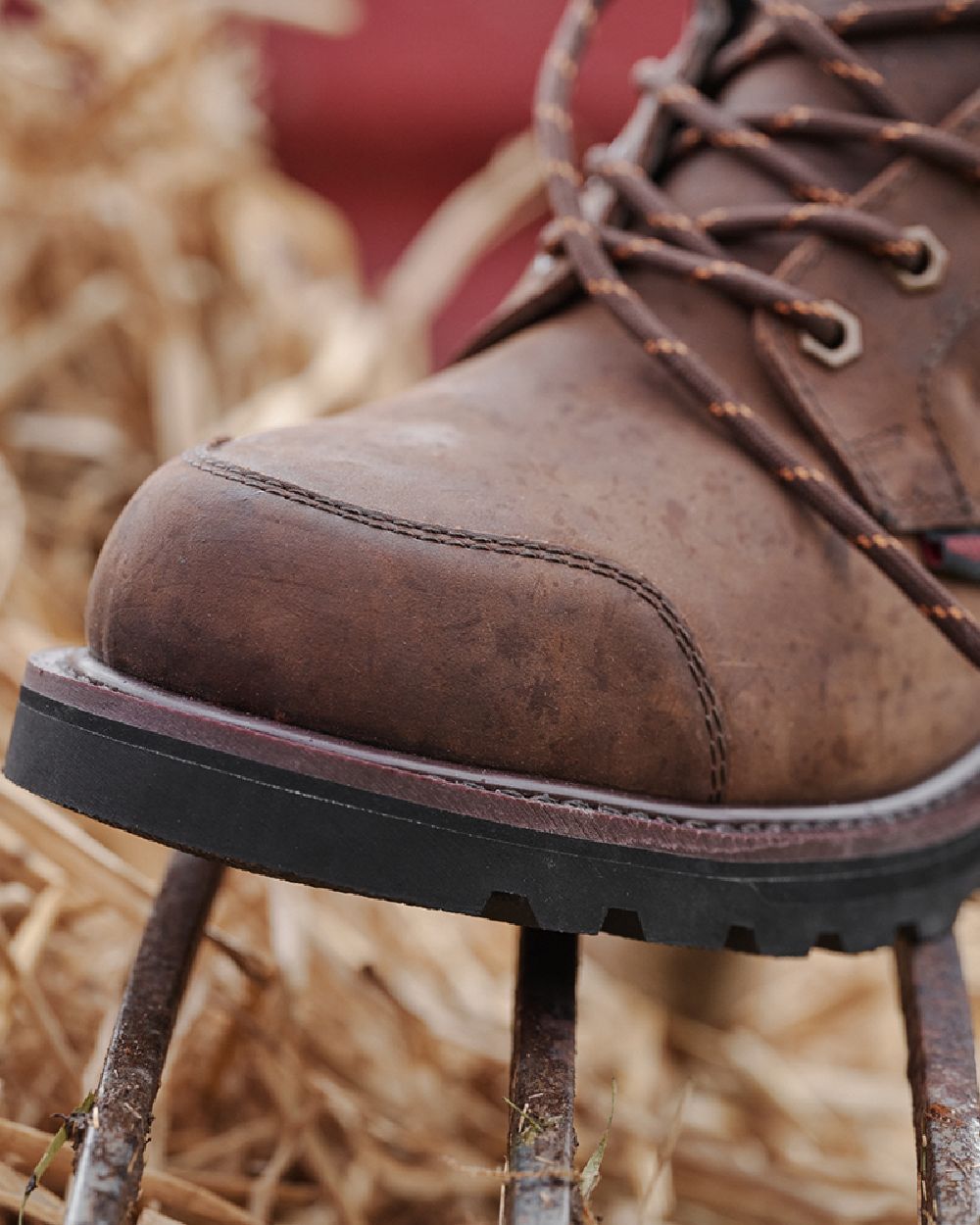 Crazy Horse Brown Coloured Hoggs of Fife Triton Pro Boots on grass background #colour_crazy-horse-brown