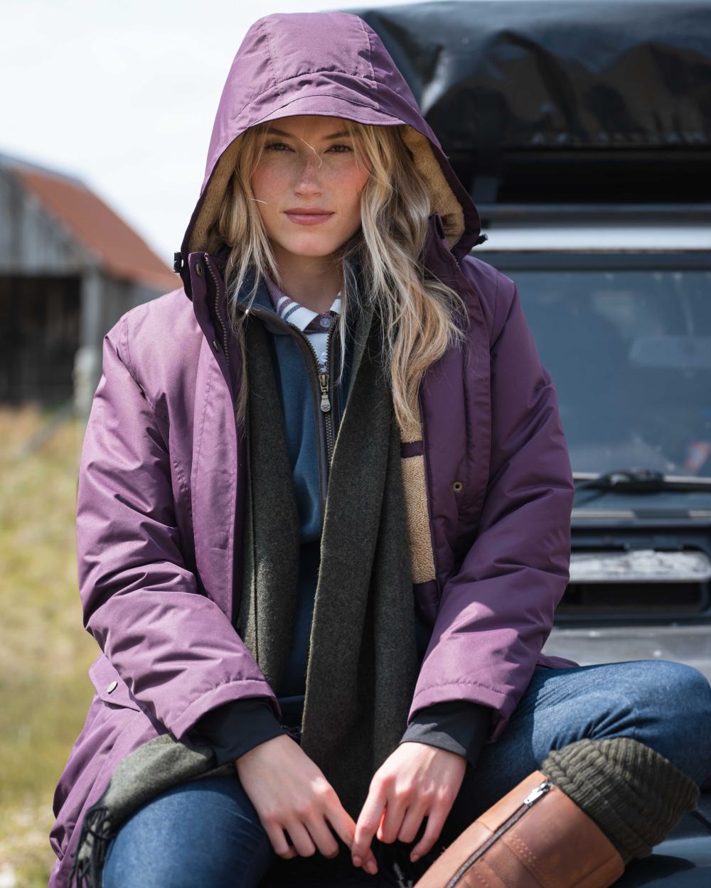 Black Berry Coloured Hoggs of Fife Womens Walker Long Coat on outdoor background #colour_black-berry
