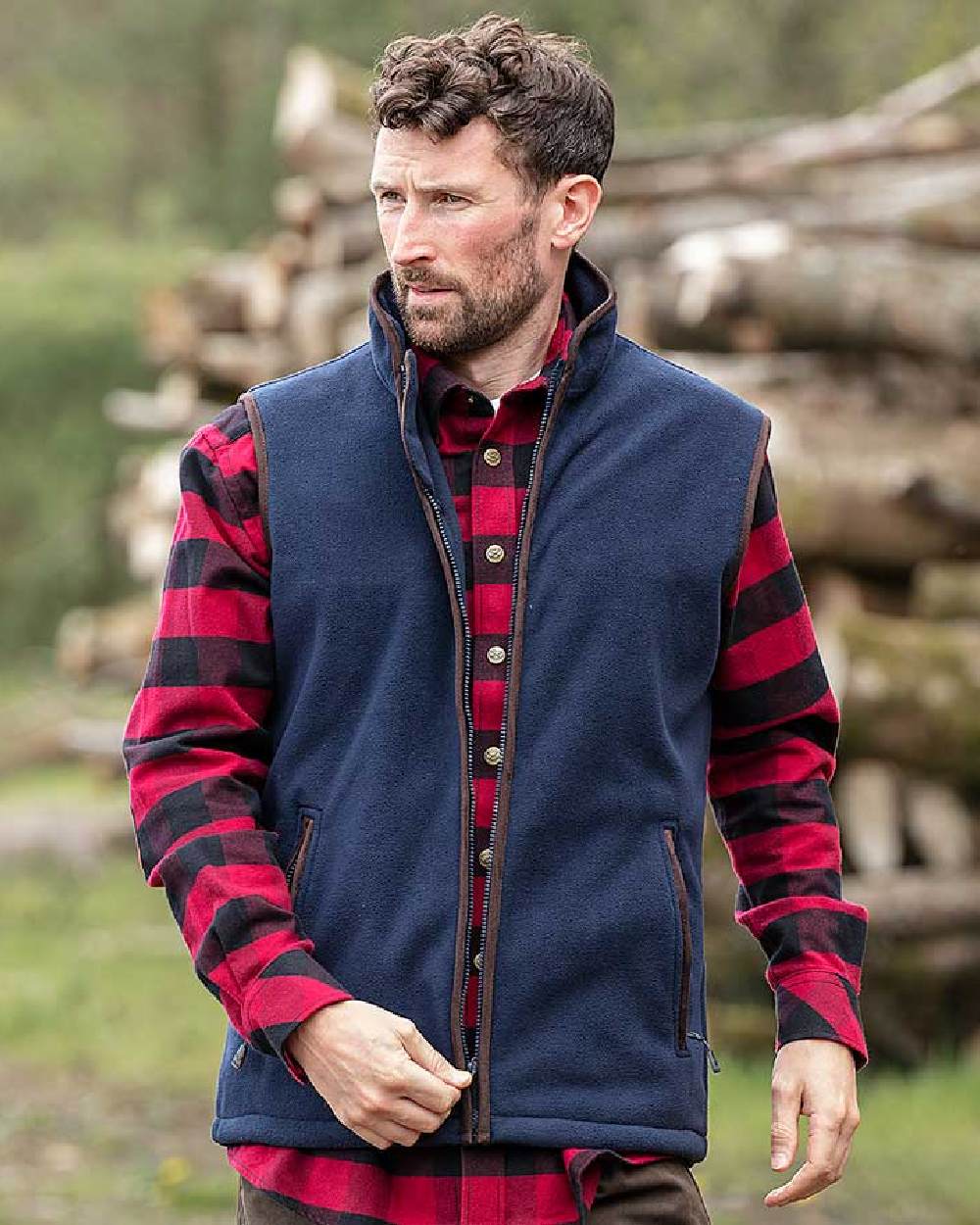 Navy Coloured Hoggs of Fife Woodhall Fleece Gilet on wood background #colour_navy