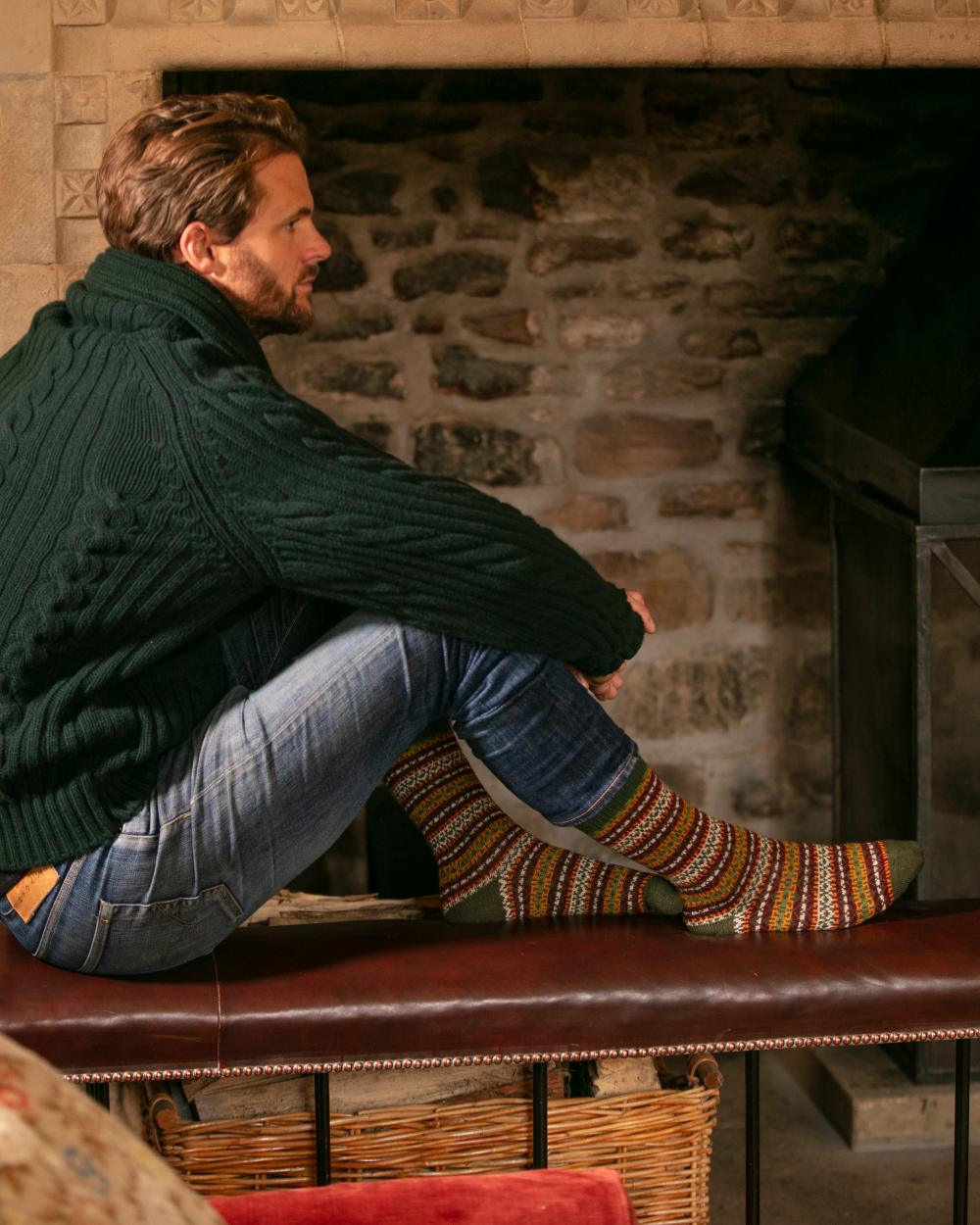 Spruce coloured House of Cheviot Fairsle Short Socks on house background #colour_spruce