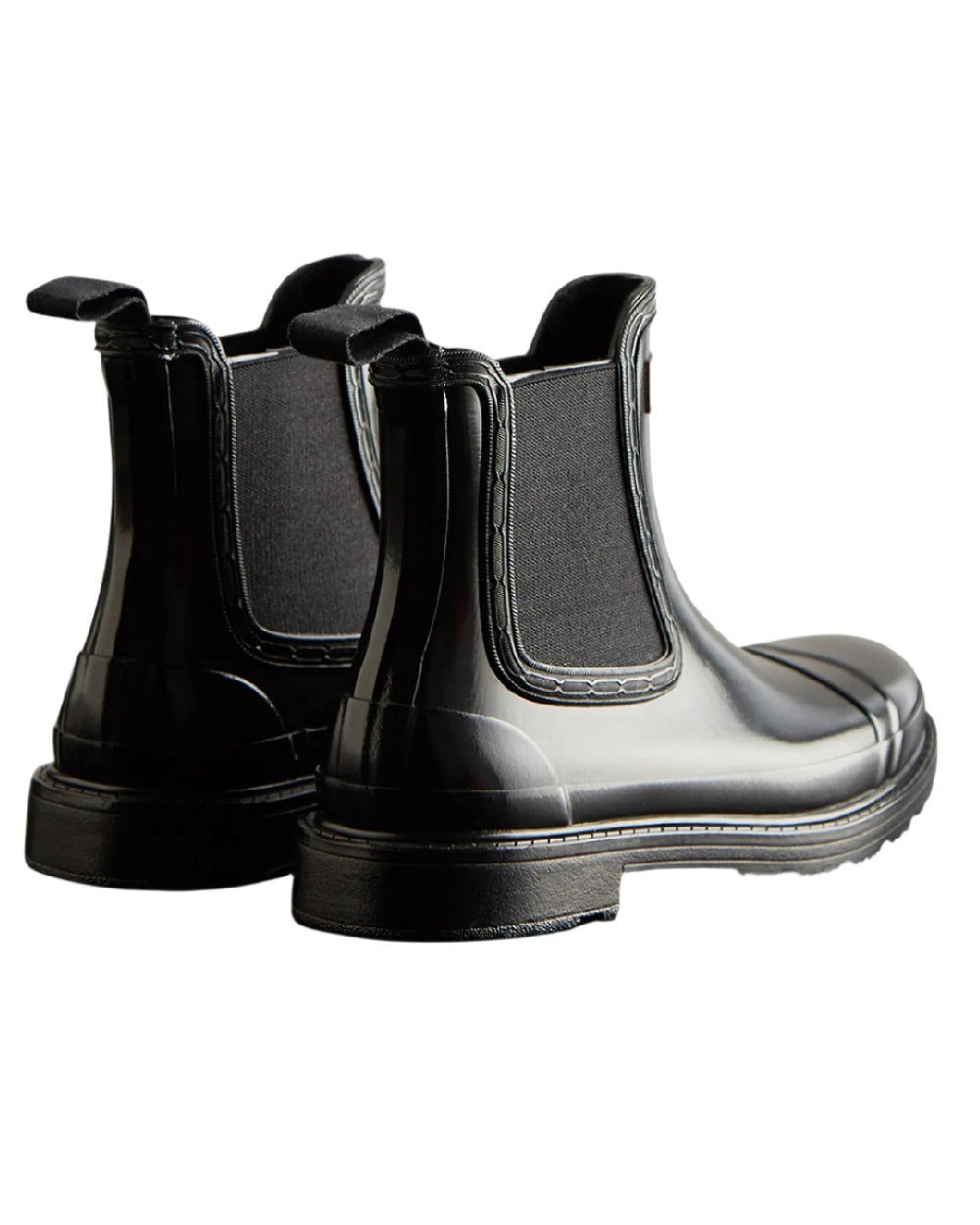 Black coloured Hunter Womens Commando Gloss Chelsea Boots on white background #colour_black