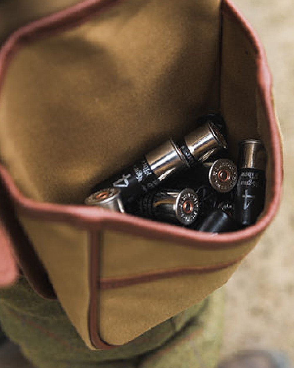 Fawn coloured Jack Pyke Canvas Cartridge Pouch on blurry background #colour_fawn