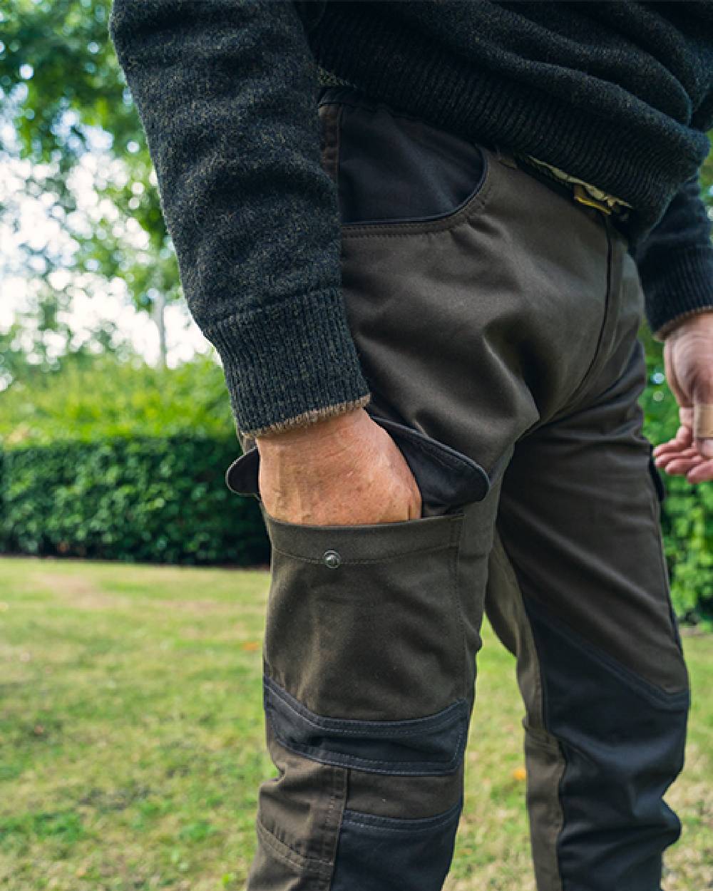 Contrast Green coloured Jack Pyke Fieldman Trousers on grass background #colour_contrast-green