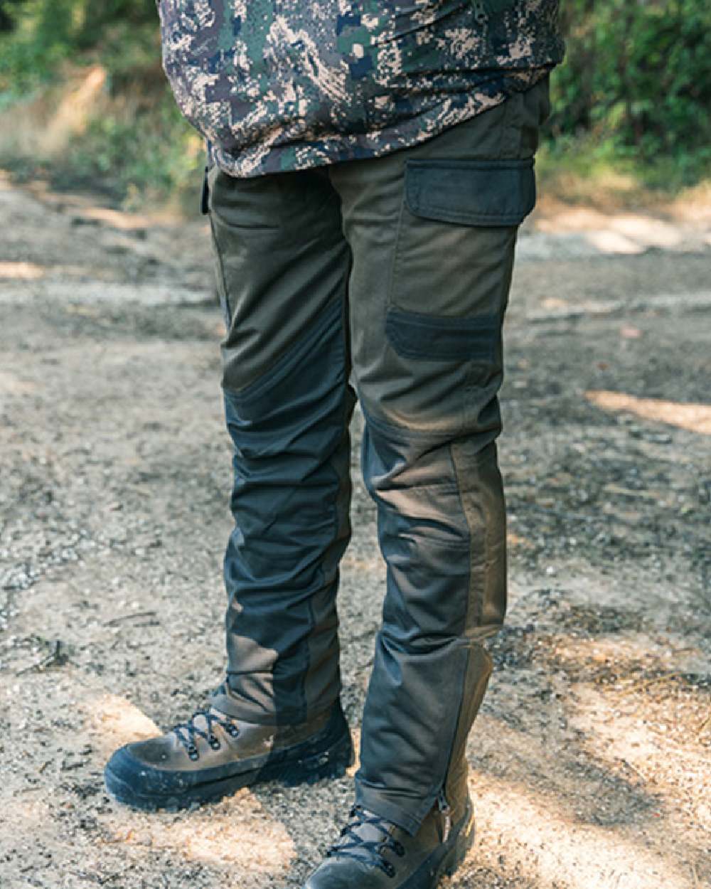 Contrast Green coloured Jack Pyke Fieldman Trousers on soil background #colour_contrast-green