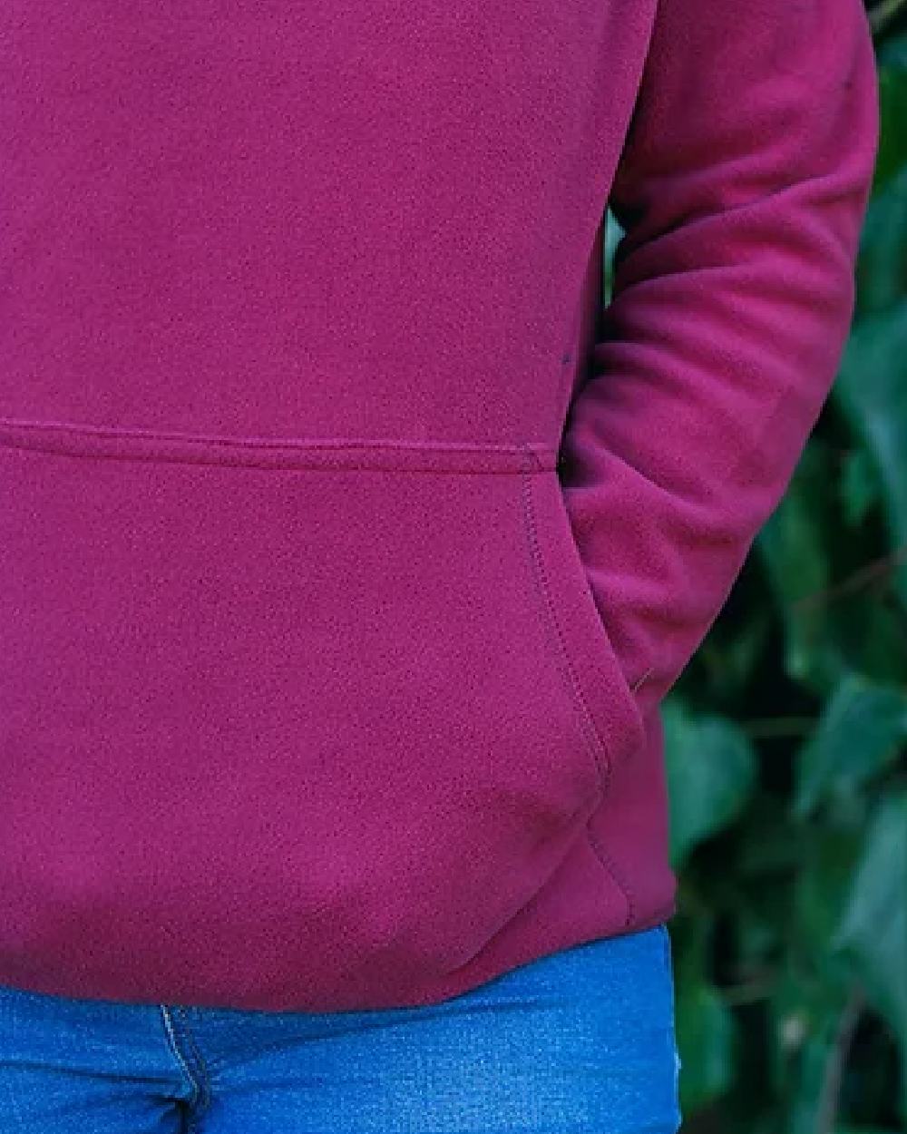 Roselle coloured Jack Pyke Ladies Fleece Hoodie on leafy background #colour_roselle