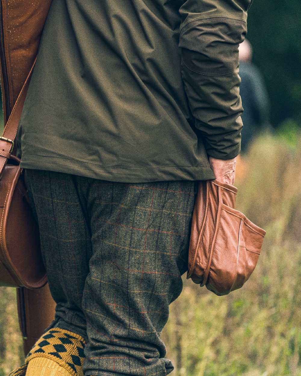 Tan coloured Jack Pyke Leather Cartridge Pouch on forest background #colour_tan
